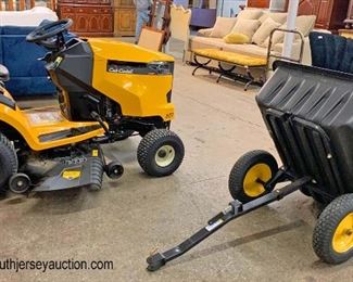  LIKE NEW Cub Cadet XT1 Enduro Series Mower Tractor, 46" Signature Cut Mower Deck and Polar Trailer by Clam 
