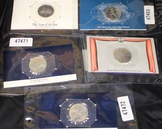  Selection of Commemorative Coins including: F-16 fighting Falcon, Marilyn Monroe, 50th Anniversary of the United Nations, The Year of the Rat, and F-100 Super Sabre 