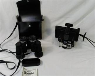 Binoculars and Vintage Polaroid camera