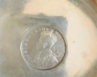 Sterling Rupee Coin set in dish