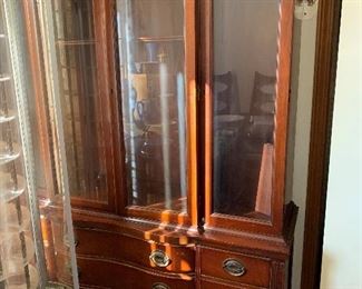 This is a very nice China cabinet and dining room table set.