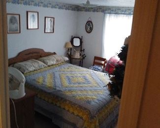 Queen size bed with headboard, frame, mattress/box springs and bed coverings.  Rarely used. 