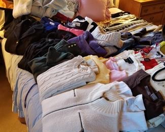 Sweaters of all types, some vintage many still retain tags. Pull overs, turtle necks, jackets, cardigans....vintage Belts and Scarves! 