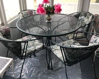 50	Wrought iron round table and 4 chairs	 $75.00 	   