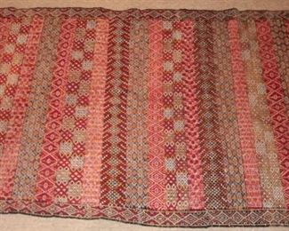 Antique quilts, textiles, and handknotted rugs