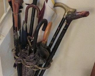 Umbrella/cane stand