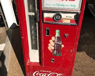 Vintage coke machine in working condition 