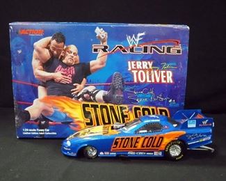 Two Action 1:24 Scale Diecast Funny Cars, Jerry Toliver WWF/Stone Cold 2000 Camaro And WWF/ XXL 2001 Firebird