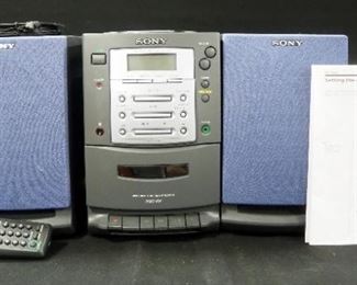 Sony Personal Component System Model PMC-107 Plays Radio, CD And Cassette With Alarm, Speakers And Manual, Powers On