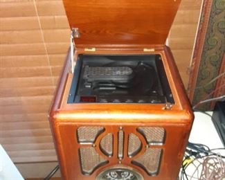 Reproduction Tombstone style table radio with 45 phonograph built-in