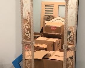 Figuratively etched Venetian mirror