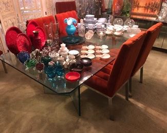 Neiman Marcus Mid Century Chrome/Glass Dining table with 6 Chrome upholstered chairs.