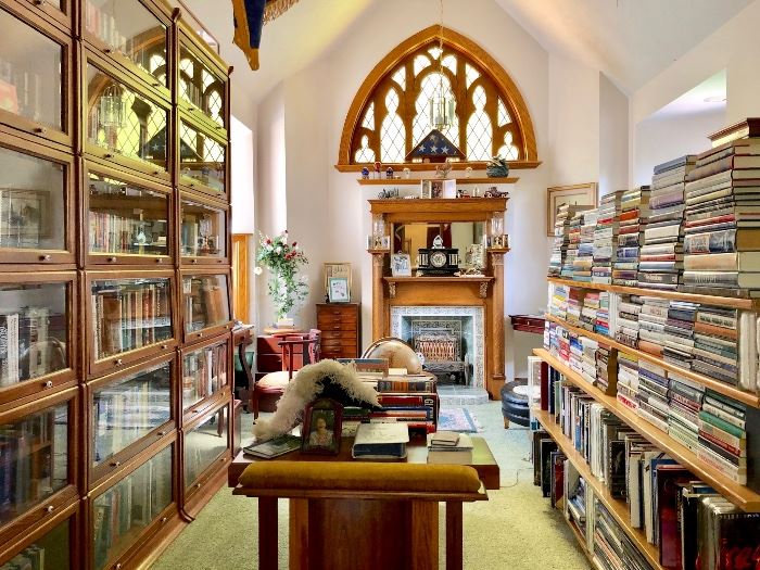 Beautiful library filled with books, 4 tall barrister book cases, an amazing library/writing desk, quilts, antiques, and so much more!