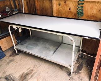 Porcelain-top mortuary embalming table