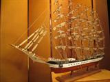 LARGE WOODEN SHIP MODEL, RED, WHITE AND BLACK HULL, FURLED SAILS, INTRICATELY DETAILED, EXCELLENT CONDITION, APPROX 35"L