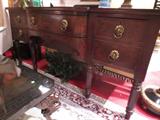 Antique mahogany sideboard with slotted bottle drawer