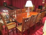 TRANSITIONAL WOOD DINING TABLE WITH LEAF, INCLUDES 10 CHAIRS WITH RUSH SEATS (2 ARMCHAIRS, 8 SIDE CHAIRS), PHOTO SHOWS LEAF INSTALLED, EXCELLENT CONDITION