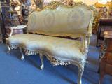 GOLD GILT CARVED ROCOCO SOFA WITH GOLD AND CREAM UPHOLSTERY IN PRISTINE CONDITION