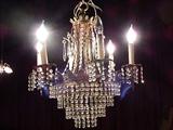 6 LIGHT CRYSTAL AND BRASS CHANDELIER