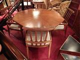 MID CENTURY MODERN OCTAGONAL DINING TABLE, CIRCA 1950's, WITH 4 COMB BACK CHAIRS