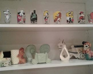 Cartoon glasses, various pottery planters, including Hull, McCoy, Hummel,  other