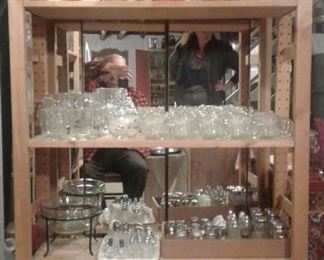 Assorted collectible tins and glassware