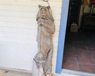 Chainsaw carved bear from tree trunk