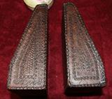 Leather bound Book ends.  There are several sets of unique book ends.