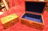 Several hand carved jewelry boxes.