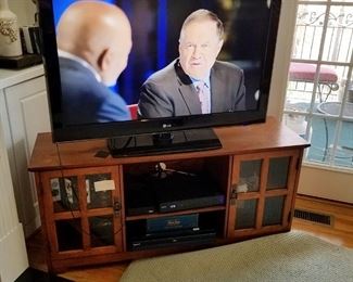 Flat screen TV with cabinet