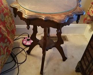 One of a pair of antique tables