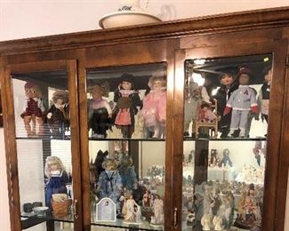 Lighted Curio Cabinet; 4 shelves, 76 1/4" W x 82" H x 21" D/Collectable dolls