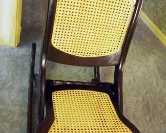 Carved Rose Back Collapsible Rocking Chair With Cane Seat And Back