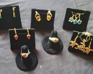 14k and 18k Fire opals, emerald, citrine, Texas cut blue topaz, etc.   More jewelry available at sale.