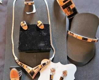 Native American inlaid sterling jewelry, tiger's eye, onyx, etc.; Calvin Begay and other artist's 