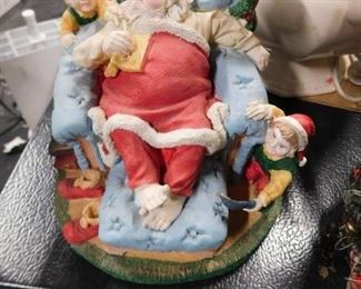 Ceramic sleeping santa with elves
