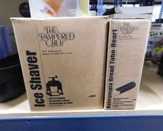 Assorted new in box pampered chef household Ice shaver & Bread tube-heart