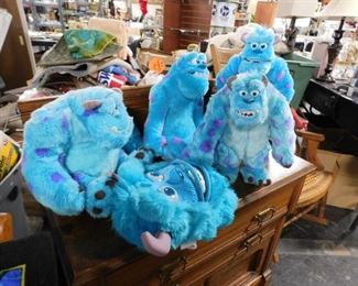 Assorted Monsters Inc plush figures sully, Mike Boo etc