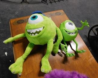 Assorted Monsters Inc plush figures sully, Mike Boo etc