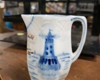 German Delft small hand painted Lighthouse theme creamer (small chip) 