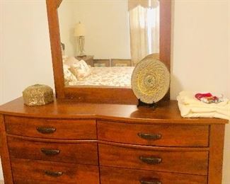 Beautiful dresser is one of several. Four bedroom suites are available 