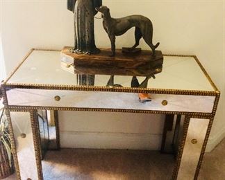 Mirrored hall table and Art Deco statue of Woman and dog