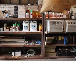 From Left to right Auto car soap $3, Bright green spray paint for line marking cases at $2 each a can, 3M Floor cleaner and strippers, 2 for $1 bottles of wallpaper remover or stripper, vintage metal autoshop lights, Twenty diiferent NOS vintage 1960s oil cans, Wallpaper stripper, General Electric 10,000 BTU A/C with only lees then 3 weeks of use for either $50 each, under the counter workshop lights $5 each, Chilton or Mitchell auto manuals 10 for $10