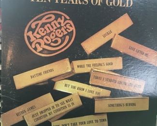 . . . Kenny Rogers . . . once, twice, three times a lady. . .