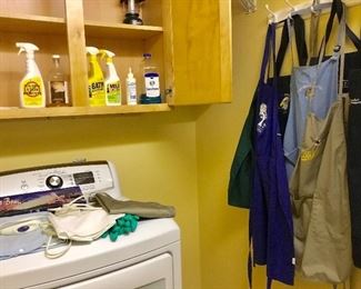 Aprons, cleaning supplies 