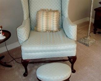 Queen Anne wing back chair and ottoman.
