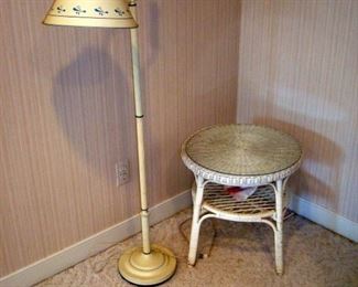 Wicker table and floor lamp.