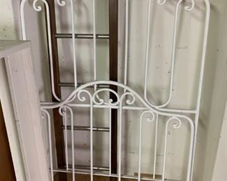 Land of Nod, cast iron, powder coated twin bed frame with steel slats.
