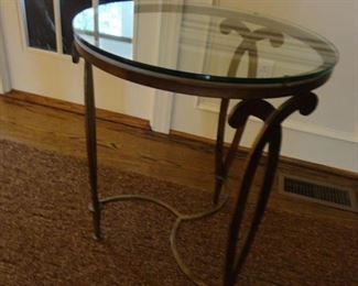 Very heavy metal table 26" tall Glass top 20" across