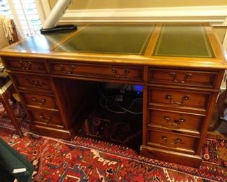 Well loved Desk with leather top. 29x54x30